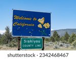 Small photo of Dorris, CA - May 26, 2023: Welcome to California sign along highway 97 in Northern California in Siskiyou County.