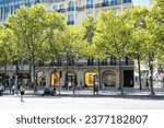 Small photo of Paris, France - August 28 2022: Champs Elysees, avenue in the 8th arrondissement of Paris, runs from Place de la Concorde to the majestic Arc de Triomphe selective focus