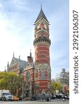 Small photo of NEW YORK CITY, USA - DEC 1, 2021: Jefferson Market Branch of New York Public Library, known as Jefferson Market Courthouse, at 425 Avenue of Americas (Sixth Avenue), in Greenwich Village, in autumn
