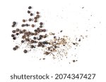 Black ground pepper powder, crushed pile with grains, isolated on white background, top view
