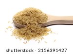 Small photo of Integral uncooked rice pile in wooden spoon isolated on white