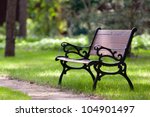 Stylish Bench In Summer Park