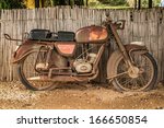 The Old  Rusty Motorcycle On A...