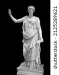 Statue of the Greek goddess Hera or the Roman goddess Juno isolated on black with clipping path. Goddess of women, marriage, family and childbirth. Ancient sculpture