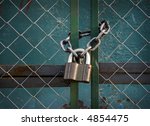 Padlock Suspended By Two Chains
