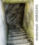 Small photo of A concrete staircase at Fort Casey on Whidbey Island descends into the bunkers.