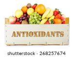 Antioxidants. Fruits in wooden box 