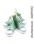 two pairs of green sneakers for ... | Shutterstock . vector #3609352