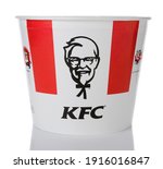Small photo of IRVINE, CA - JANUARY 15, 2015: A Bucket of KFC Chicken. Initially Kentucky Fried Chicken, founded by Harland Sanders, the fast food restaurant chain is now owned by Yum! Brands.