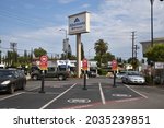 Small photo of Los Angeles, CA USA - August 10, 2021: Parking spaces reserved for delivery and online shopping order pickup at Albertson's store