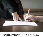 Small photo of Closeup view law lady notice page buy work care read concept text space. Age alone human male solicitor arm hold teach sign adult lone ill sick man notepad pay sell tax card dark black wood home table