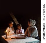 Small photo of Old jew refugee femal mum pray care look worry offer loaf hope life issue help needy pauper charity 1930s concept. Dark retro jewish home room table candl great war hardship recess dine dearth concern