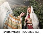 Small photo of 2 young human faith Lord hand ask god drink offer help jew maid slave look stare gossip hold old retro jar vase arab shawl cloth. Bless joy hope israeli rural lady chat preach face farm yard hous home