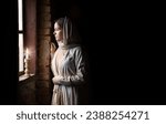 Small photo of Lone retro rural veil cloth jew slave maid life sad poor lady face look cry plead bible Jesus. Holy cold kid child think ask beg old biblical god Christ wait even flame light war home room text space