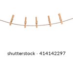 clothespins on rope isolated