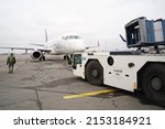 Small photo of Almaty, Kazakhstan - 03.16.2022 : The plane of the Mongolian airline Hunnu Air is parked at the airport site.