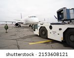 Small photo of Almaty, Kazakhstan - 03.16.2022 : The plane of the Mongolian airline Hunnu Air is parked at the airport site.