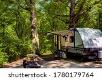 Travel trailer camping in the woods at starved rock state park illinois