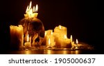 Candles And Human Skull In...