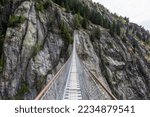 Small photo of Suspension bridge Aspi - Titter over de Weisswasser gorge (Fieschertal, Bellwald, Valais, Switzerland)