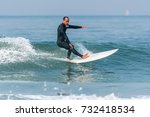 Surfer In Action With A Small...