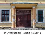 Small photo of SIGHETU MARMATIEI, ROMANIA - JUNE 2021: Entrance to the old, building of "Casa Municipala De Cultura, Sala De Spectacole Viorel Costin", Sighetu Marmatiei, Romania