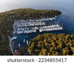 Small photo of Sailing in Croatia. Sveti Klement (St. Clement) island of Pakleni islands. Marina sunset in Palmizana village.