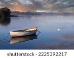 Lake of Sjaelso and boat in Denmark in Autumn