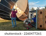 Hot air balloon fire burner. Hot air balloon preparing for the flight with propane gas heat in Klaipeda Lithuania.