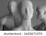 
front image of shiny white female mannequin doll with a male mannequin figure in the back, on black and white background. front image of a display dummy figures