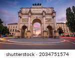  Munich, Germany. Cityscape image of Munich, Bavaria, Germany with the Siegestor at summer sunset.