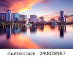 Orlando, Florida, USA downtown city skyline from Eola Park.