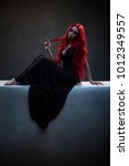 Beautiful Red Haired Woman In...