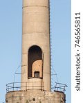 Small photo of ROSEMOUNT, MN/USA - JULY 26, 2016 - A close-up of a smokestack at the Gopher Ordnance Works, a WW II-era munitions plant in Rosemount