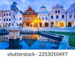 Telc, Czech Republic. Hradce Square of historical Teltsch with its famous 16th-century colorful houses, UNESCO World Heritage Site historical Moravia. Water reflection twilight scene.