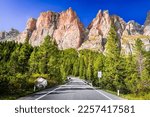 Dolomites, Italy. Winding road to Sella Pass and Sella Ronda mountain ridge, Bolzano landscape in Sudtirol.