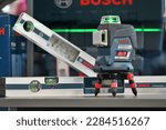 Small photo of Kaunas, Lithuania - March 30, 2023: Professional electric Bosch brand level tools for sale in Kaunas, Lithuania