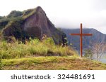 Small photo of TARLAC, PH- Oct. 5: Crater of Mount Pinatubo cross on October 5, 2015 in Tarlac, Philippines. Lake Pinatubo is the summit crater lake of Mt, Pinatubo formed after its climactic eruption on June 1991.
