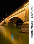 Small photo of A bridge (from London) was brought over and built in Lake Havasu City, Arizona. Photographed at night underneath the bridge.