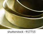 Small photo of Stack of shopworn baking pans in various sizes.