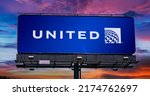 Small photo of POZNAN, POL - JUN 23, 2022: Advertisement billboard displaying logo of United Airlines, a major U.S. airline headquartered at Willis Tower in Chicago, Illinois