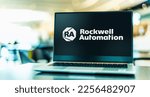 Small photo of POZNAN, POL - DEC 28, 2022: Laptop displaying logo of Rockwell Automation, a provider of industrial automation whose brands include Allen-Bradley, FactoryTalk software and LifecycleIQ Services