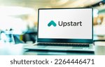 Small photo of POZNAN, POL - OCT 13, 2021: Laptop computer displaying logo of Upstart, an AI lending platform that partners with banks and credit unions to provide consumer loans