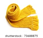 knitted yellow scarf with fringe on white background