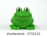 Green Plastic Toy Frog On White ...