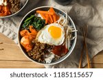 Spicy Homemade Korean Bibimbap Rice with Egg and Beef