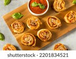 Homemade PIzza Roll Appetizers with Cheese and Marinara Sauce