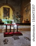 Small photo of ALBANO AZIALE, ITALY - OCTOBER 4, 2019: Altar in the San Peter Romanesque Church built by Pope Ormisda (514 - 523 A.D.) from one of the big rooms of the baths that emperor Caracalla