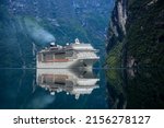 Small photo of Cruise Ship, Cruise Liners On Geiranger fjord, Norway. The fjord is one of Norway's most visited tourist sites. Geiranger Fjord, a UNESCO World Heritage Site