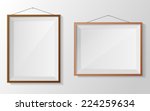 photo frame on white wall.... | Shutterstock .eps vector #224259634
